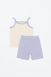 AVAUMA Laila Day baby sleeveless top and shorts set in lilac cream color, flat lay product image